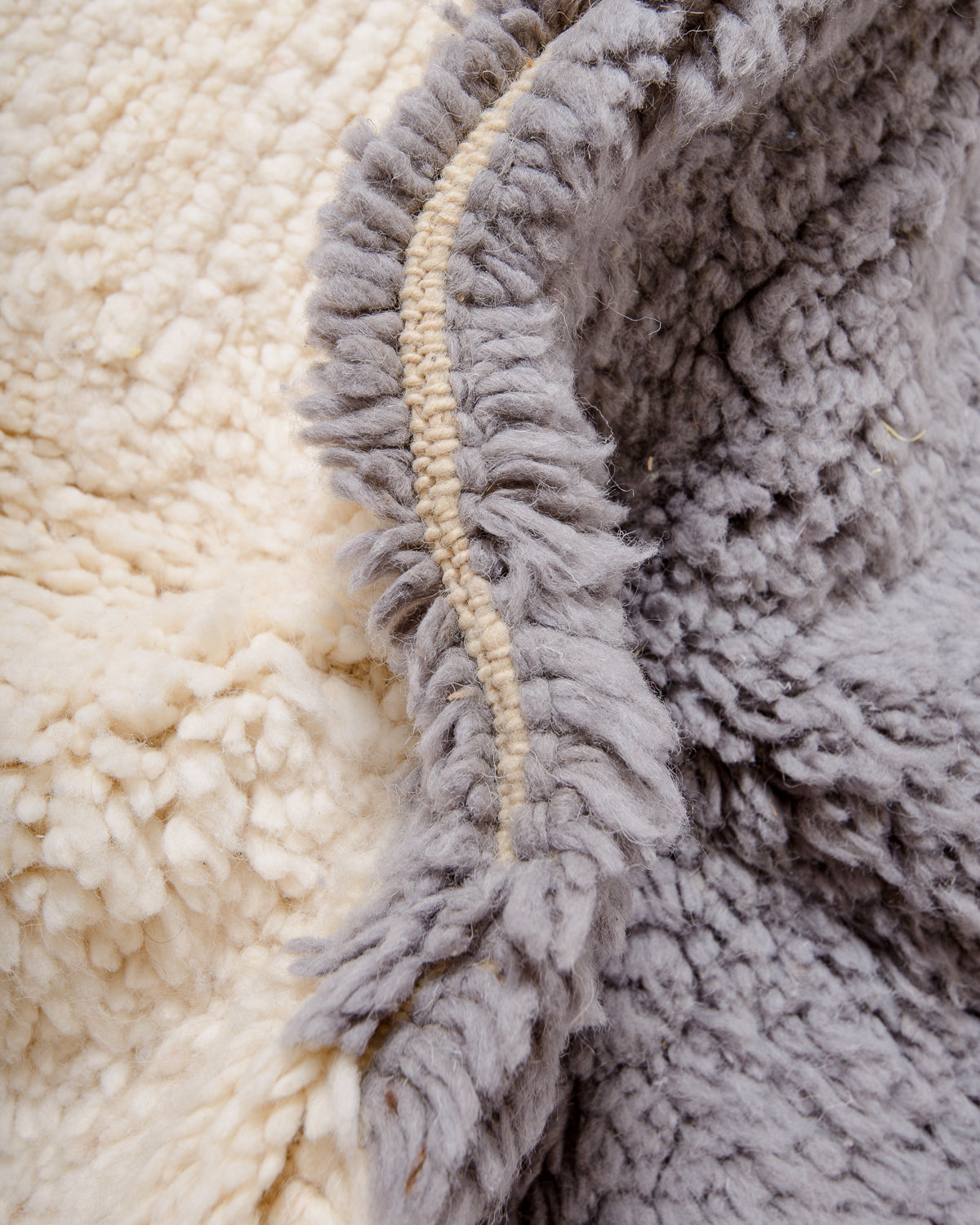 Modern, designer, handcrafted Berber rug from Morocco. Beniourain carpet with beautiful colours and patterns and fluffy wool texture.